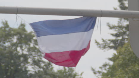 240 fps slow motion upside down dutch flag hanging on traffic light