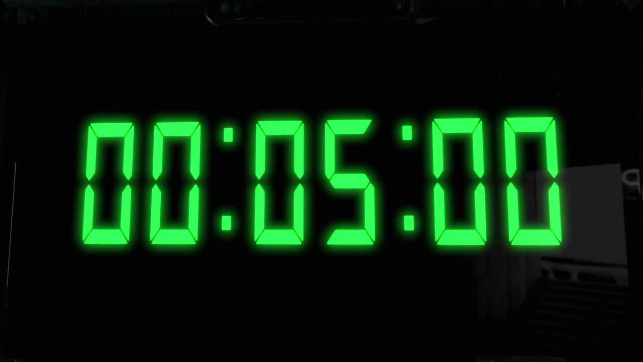 High quality CGI render of a digital countdown timer on a wall-mounted screen, with glowing green numbers, counting down from 10 to zero, with with camera slowly pushing in dramatically