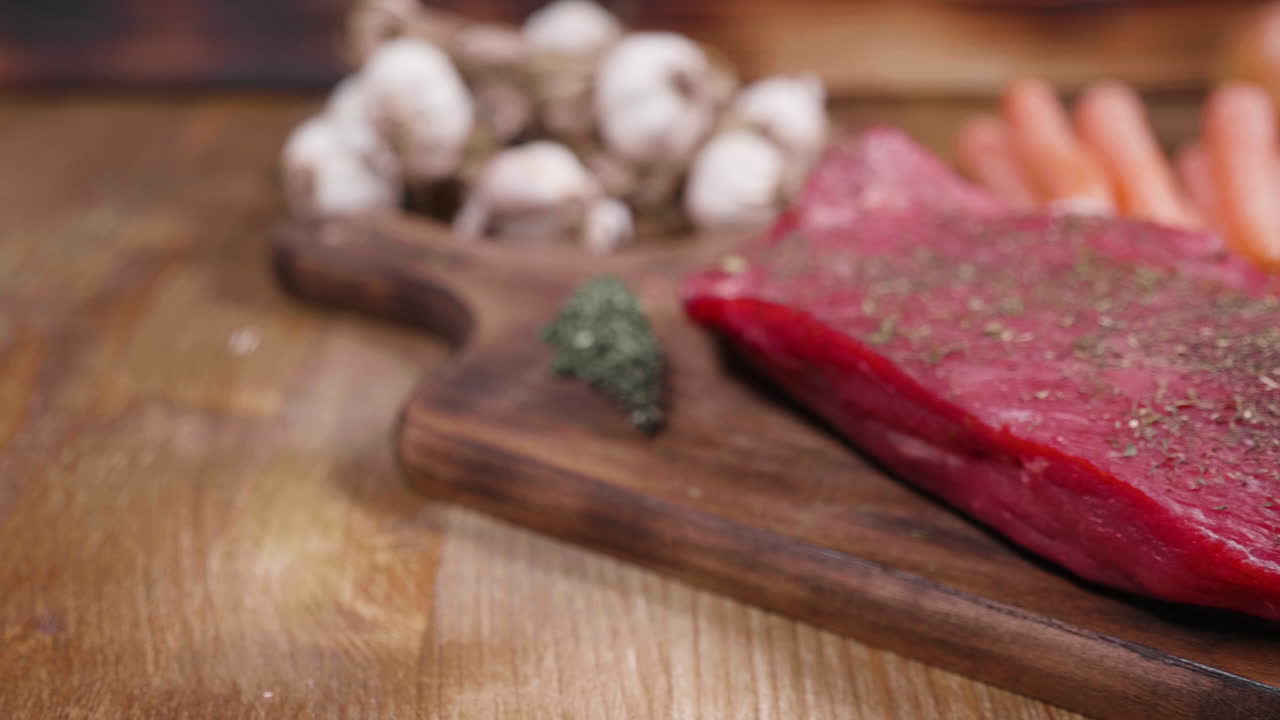Preparing a Steak with Fresh Ingredients