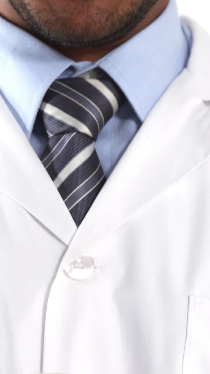 Doctor holding human brain model