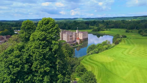 aerial view of a castle on a golf course