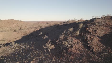 Smooth-Aerial-footage-of-rocky-hills-near-Broken-Hill,-NSW,-Australia