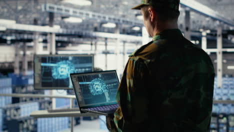soldier in engineering role uses ai on laptop to manage server hub systems