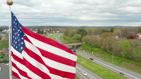 close-up aerial of america flag waving in breeze