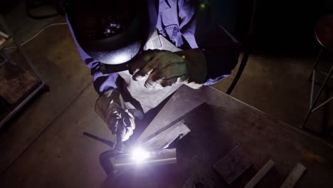 welder welding a metal