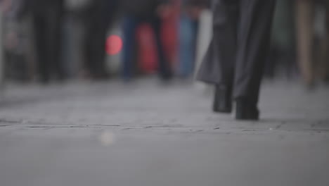 people walking on a city street