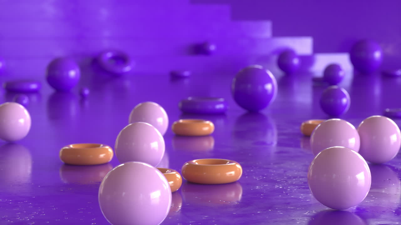 4K video animation. Colorful and shiny spheres and rings falling.