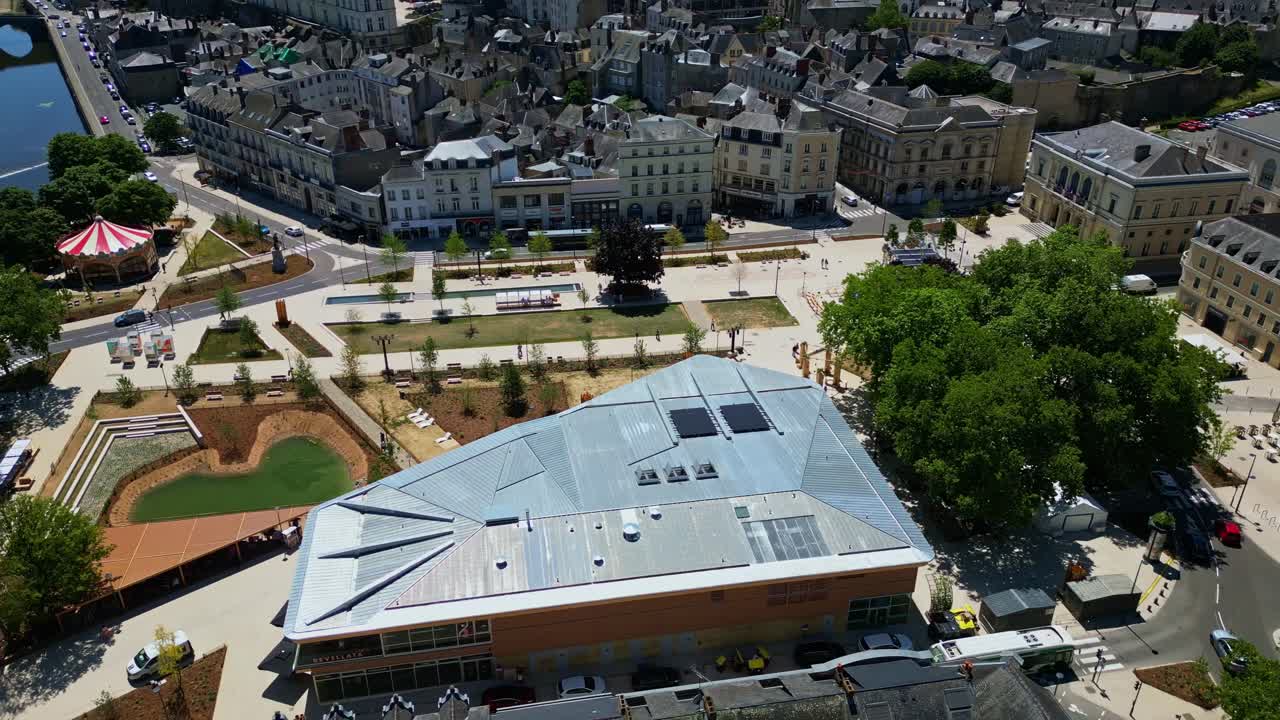 Panorama drone view of the rebuilt touristic place at New Place from November 11th with St. Louis market halls and landscaped park, Laval, Mayenne, France.