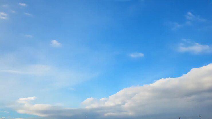 Blue Sky with Fluffy White Clouds