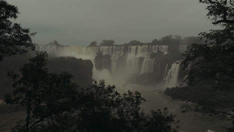 Beautiful-view-of-Iguazu-Falls-between-trees-frame