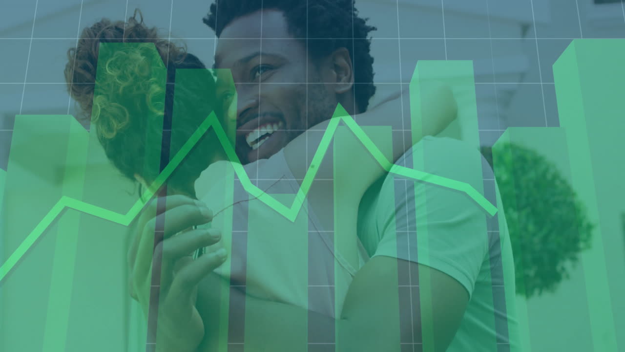 Financial graph animation over happy couple embracing