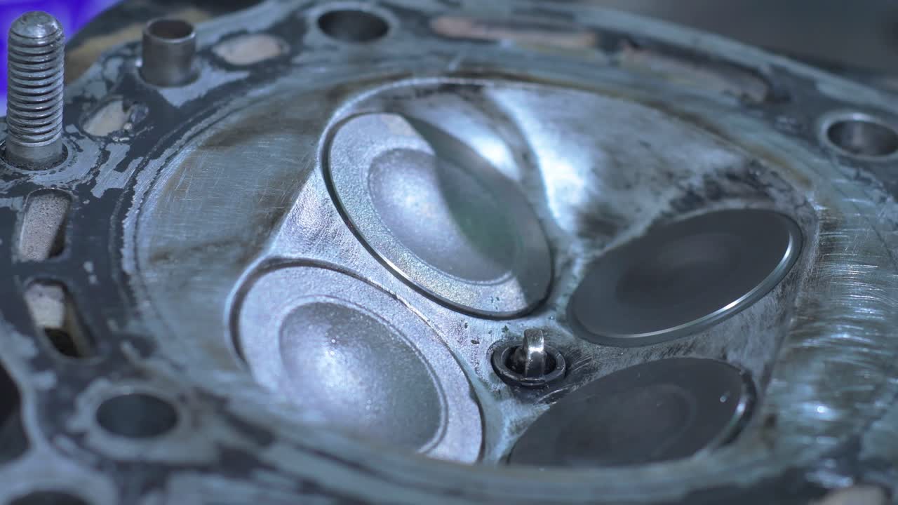 Close-up of engine valve opening and closing in detailed motion