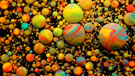 slow motion bright colors bubbles oil beautiful paint universe color moving multicolored close up. acrylic paint. fantastic hypnotic surface. abstract colorful paint metamorphosis structure bubbles