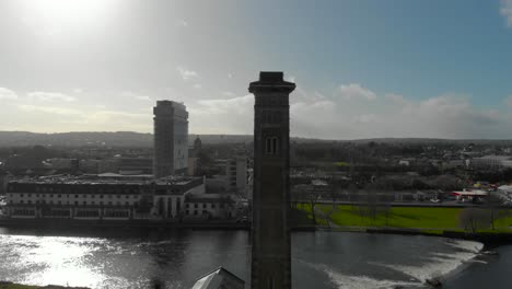 an aerial shot of the chimney of the waterworks experience in cork, drone shot