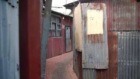 cinematic shot of interior slum settlement at day in slow motion in costa rica