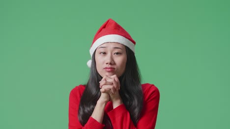 woman in santa hat, waiting
