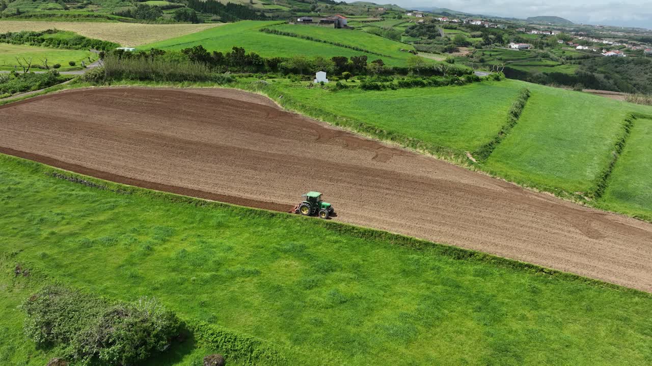 Farm Tractor At S&atilde;o Miguel Agriculture Land In Azores Island, Portugal