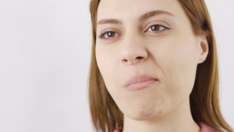 woman eating chocolate in close-up. eating chocolate.