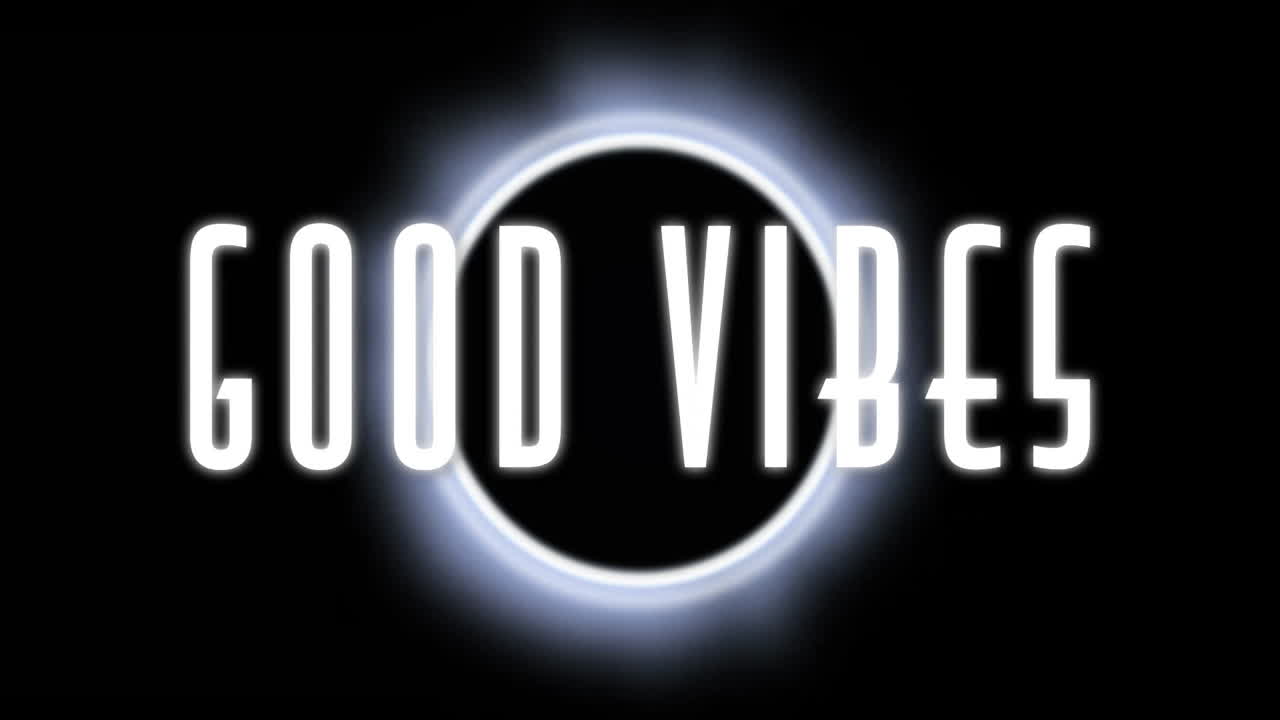 Animazione del testo "Good Vibes" su eclissi luminosa su sfondo nero