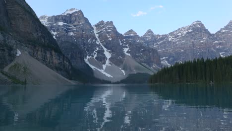 moraine lake waters reflect the jagged silhouettes of ten majestic peaks