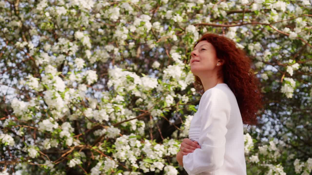 Woman in Springtime Flowers