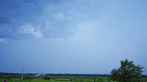 real flashes of lightning on the blue sky background. the blue sky changes its color into orange after the bright lightning.
