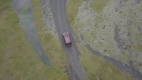 aerial video of 4x4 car driving on dirt roads in iceland