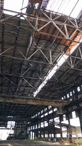 abandoned factory interior. old industrial building for demolition vertical video