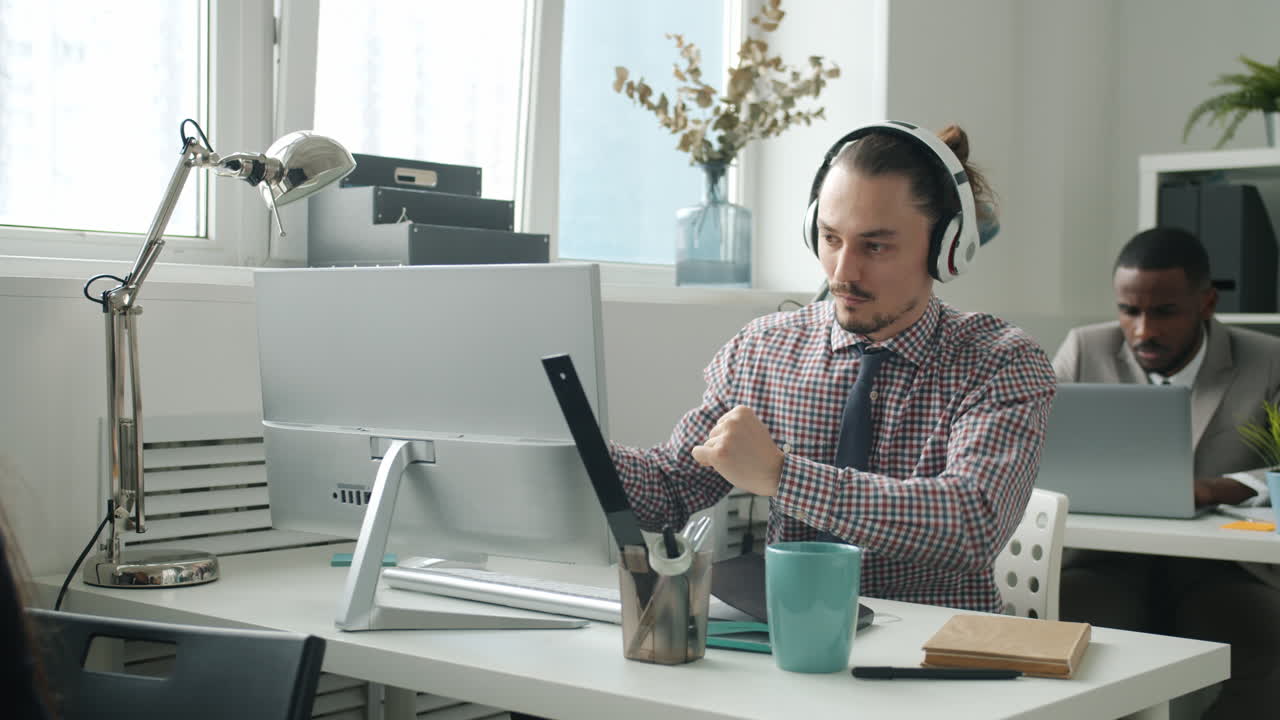 Two colleagues working in an office