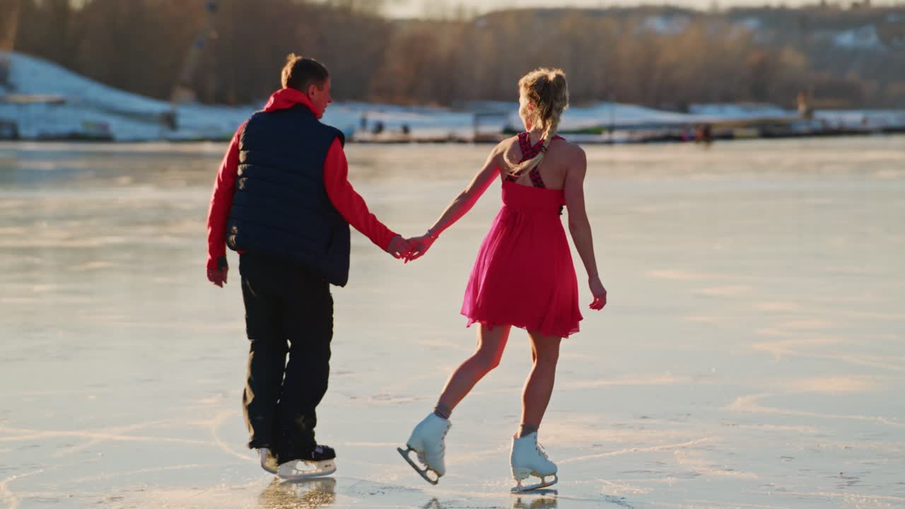 Couple Ice Skating on a Frozen Lake