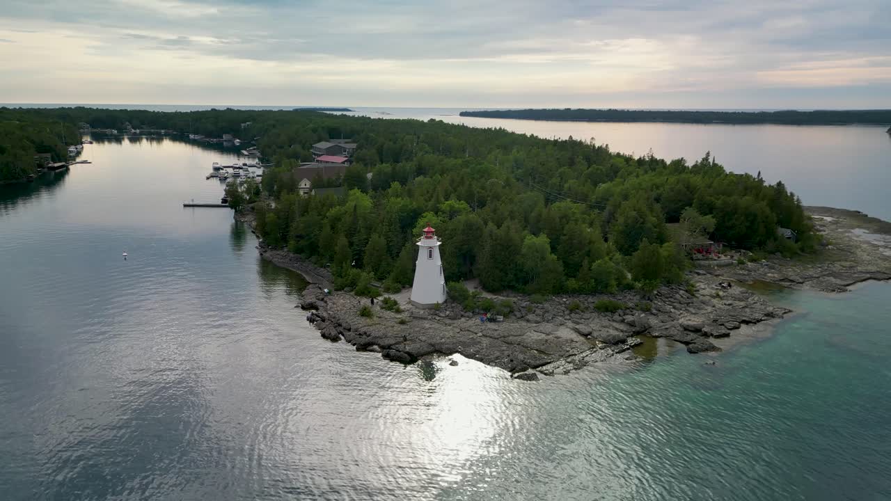Aerial View of a Lighthouse on a Secluded Island