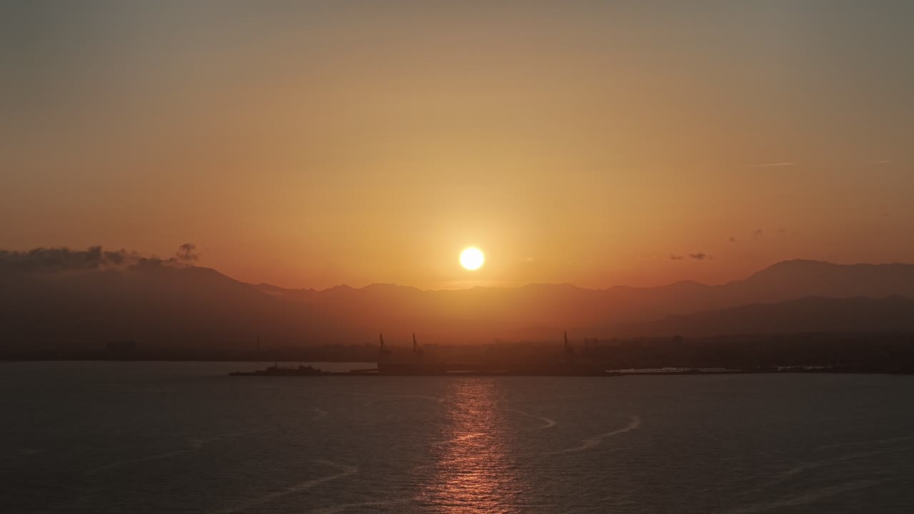 Dramatic scenery sun going down in the shore of Malaga