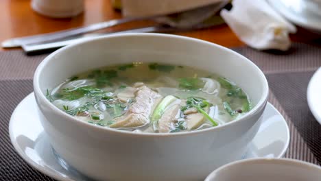 hot vietnamese pho soup with steam rising