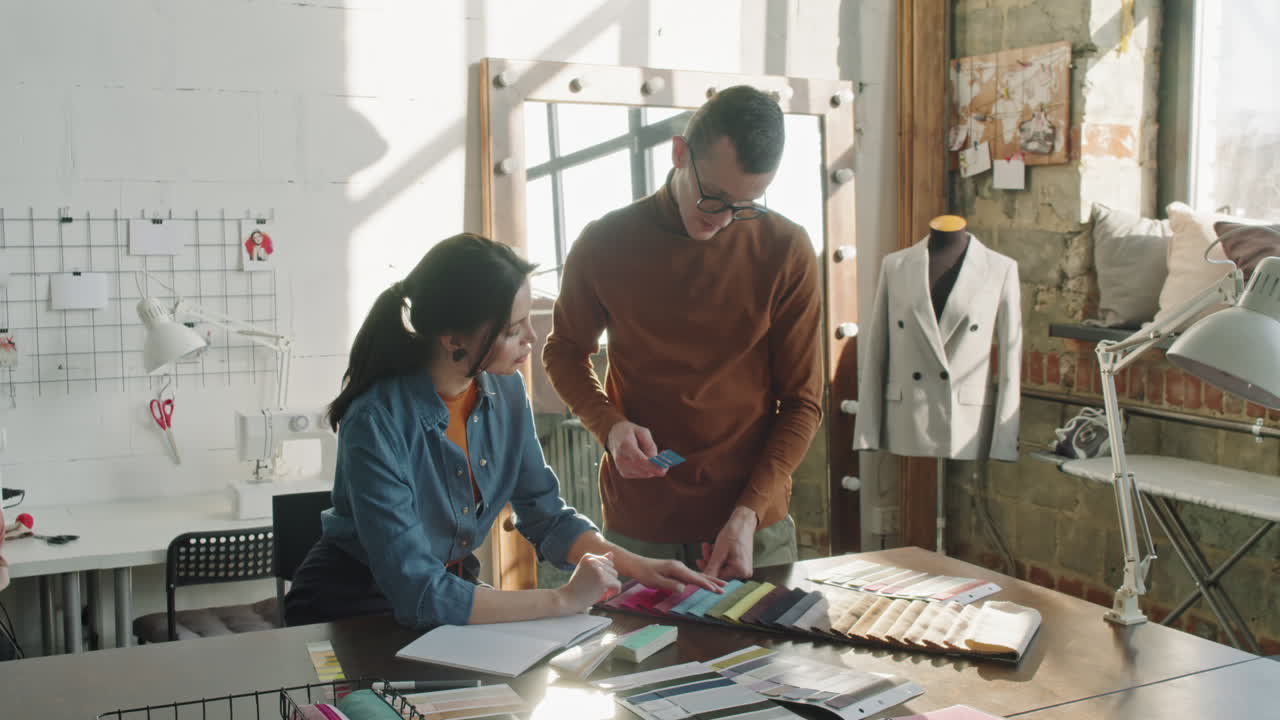 Fashion Designers Discussing Ideas