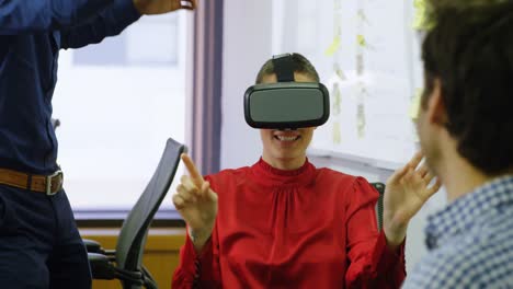 executive using virtual reality headset at desk 4k