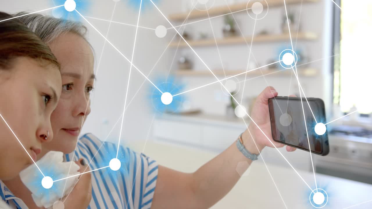 Mom holding phone teen leaning in phone initiating glowing node overlay expanding for tech sharing