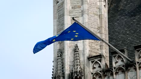 european union flag on old building