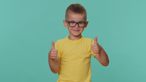 Happy-toddler-children-boy-raises-thumbs-up-agrees-with-something-or-gives-positive-reply,-like-good