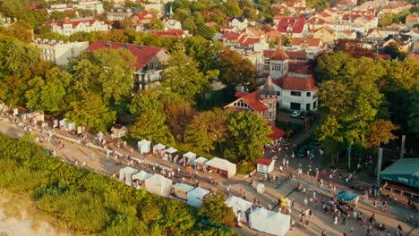 People-walking-on-the-promanade-in-setting-sun