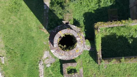 top down view over ruins of fabrica da luz in segade de arriba, caldas de reis, spain - drone shot