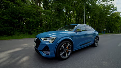 audi electric luxury suv. presentation of the new audi electric car on road