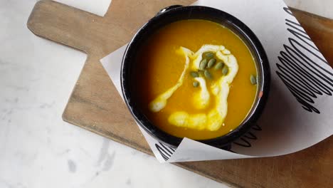 creamy pumpkin soup with toasted pumpkin seeds