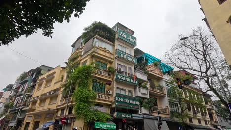 urban life unfolds on a bustling hanoi street