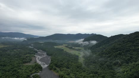 4k: aerial view of the verdant mountains in the eastern region of georgia on a cloudy day