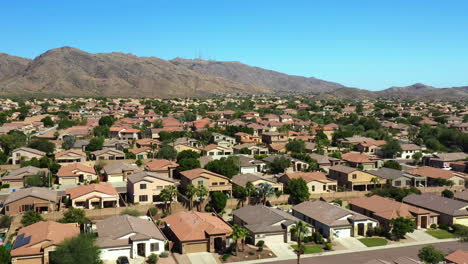 drone shot over suburban houses in ahwatukee foothills village, in arizona, usa