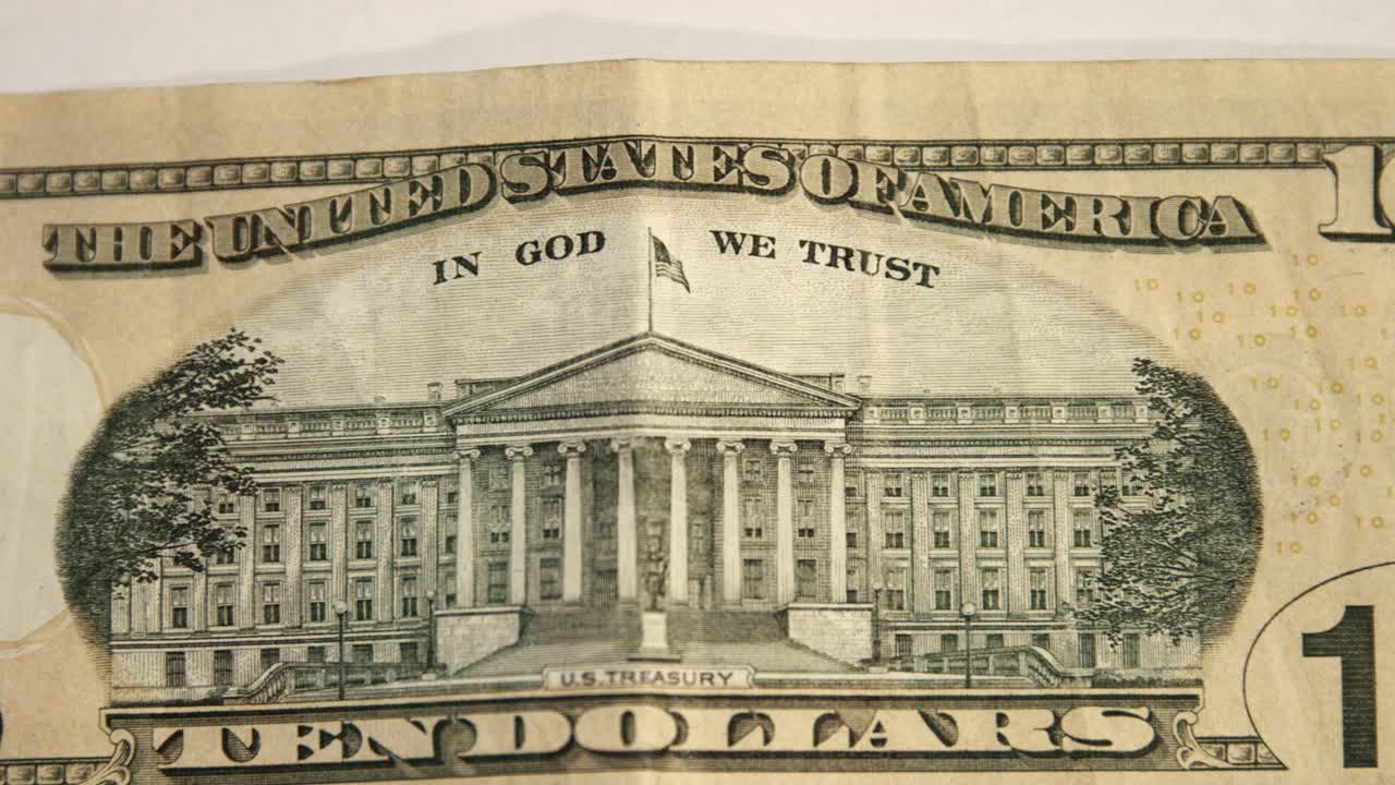 Banconota da dieci dollari USA. Primo piano di valuta americana, Stati Uniti. Retro della banconota da 10 dollari.