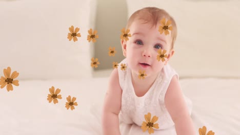 Animation-of-falling-flowers-over-baby-girl