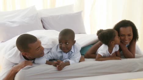 Happy-AfroAmerican-family-under-the-sheets