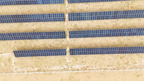 drone footage offers a top-down view of hundreds of solar panels at a power plant in uliastai, mongolia, highlighting the impressive scale of renewable energy in this remote desert region.