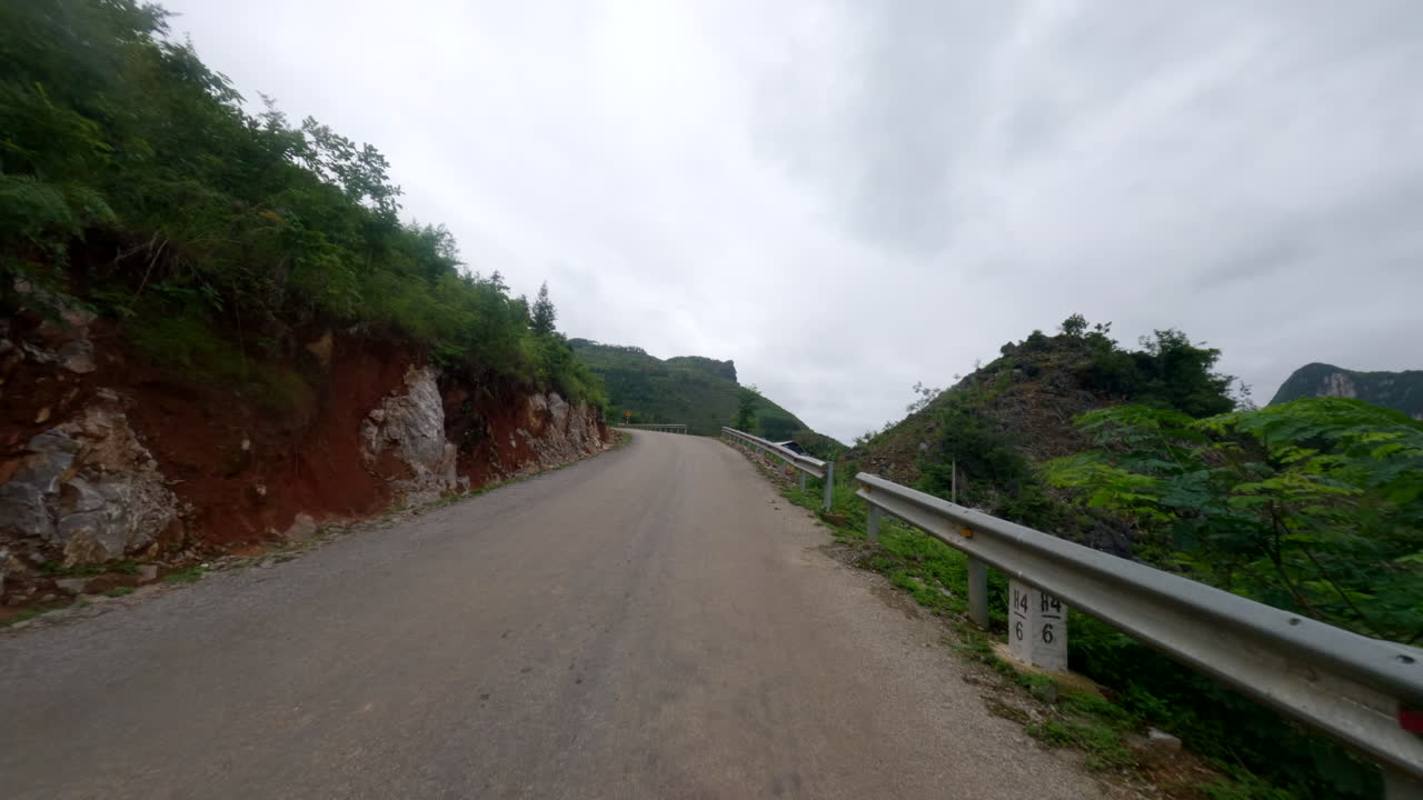 Traveling Across The Remote Road Of Ha Giang Loop In Northern Vietnam. POV Shot